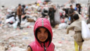 SANAA  YEMEN - JULY 10  A Yemeni poor boy looks at as he searches for recyclable items among garbage to be sold and get money for offering their needs  at a garbage dump on July 10  2018 north Sanaa  Yemen   Photo by Mohammed Hamoud Getty Images